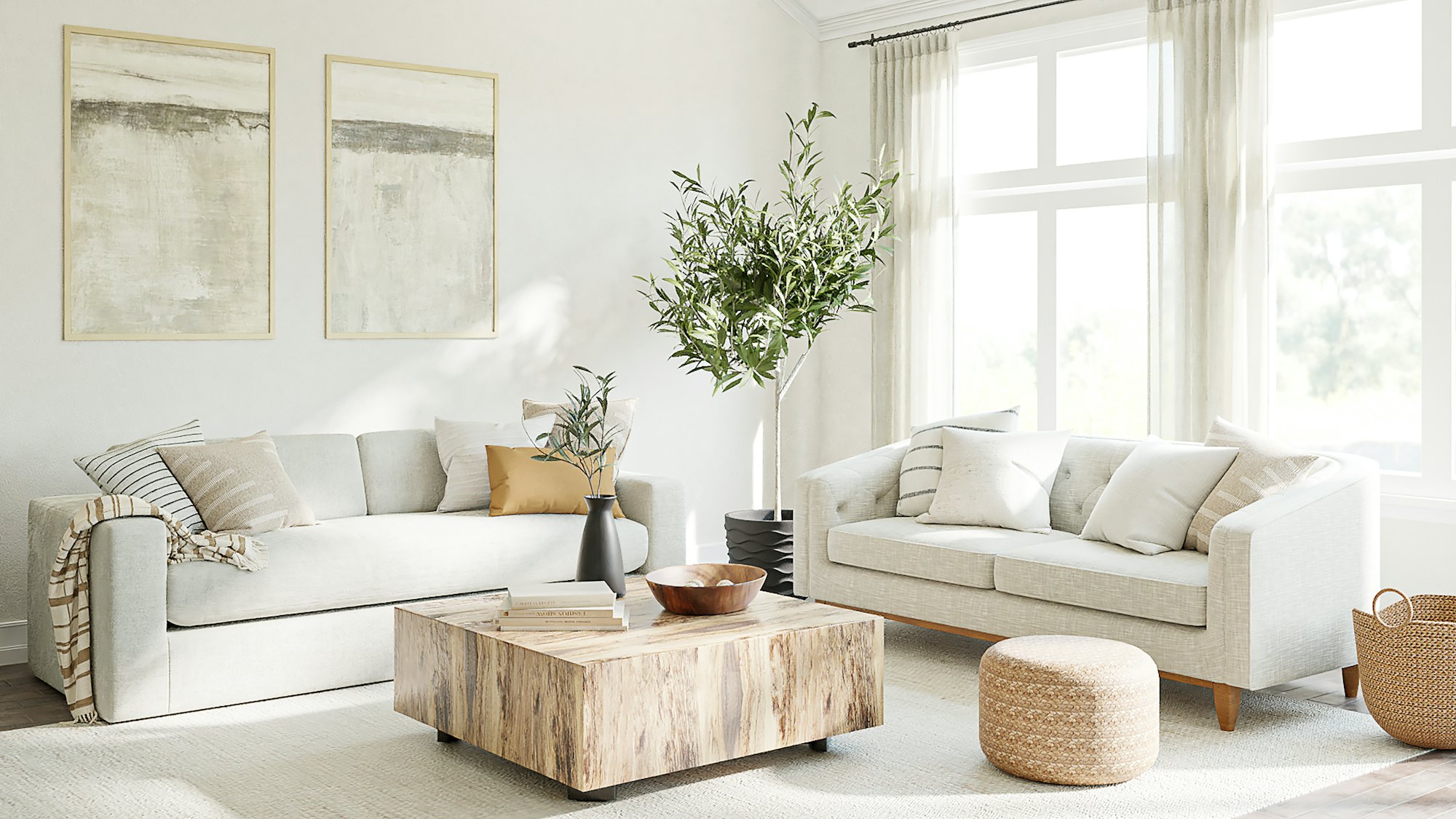 Bright, neutral living room with tall windows dressed in soft sheer fabric